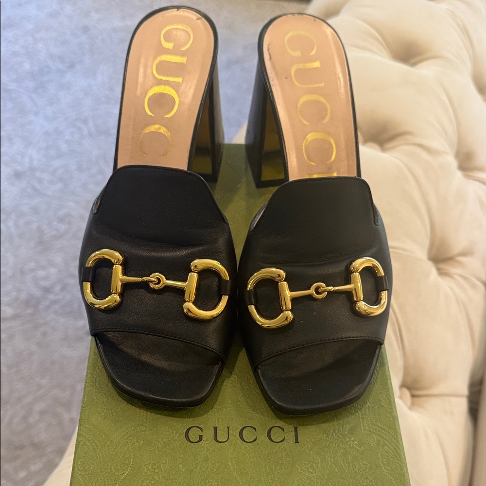 Gucci Black Heels with Gold Detailing